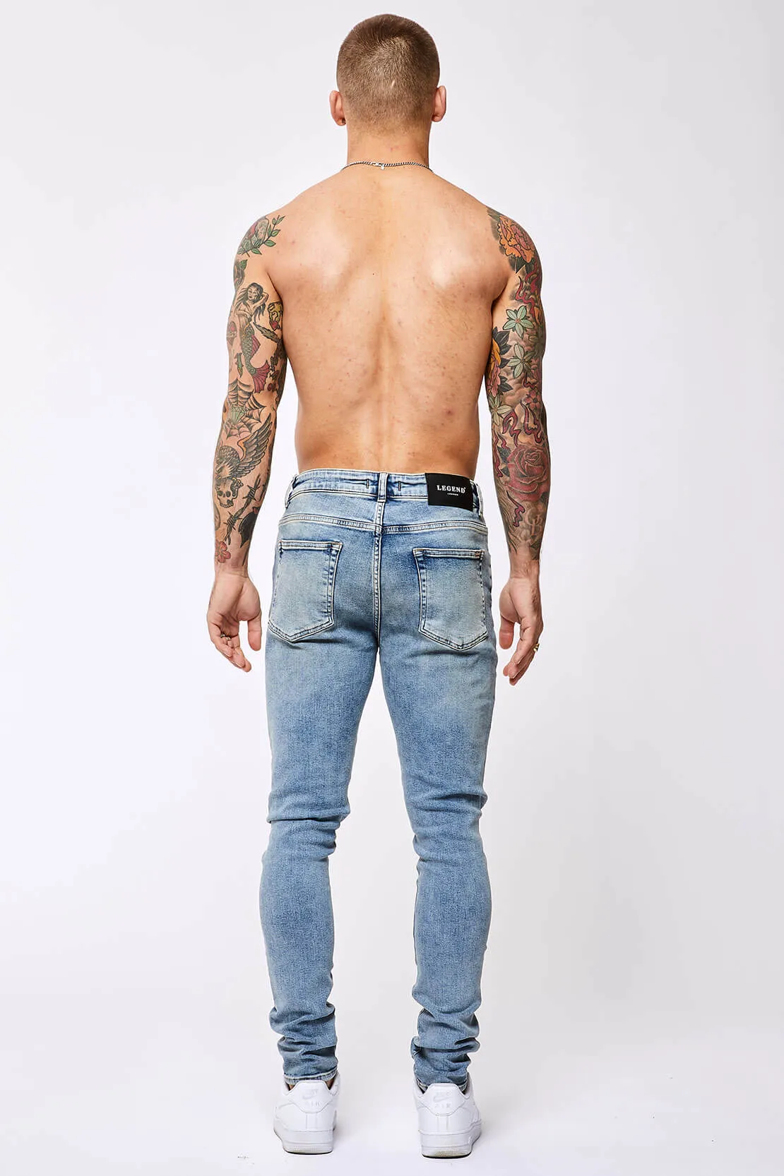 SKINNY FIT JEANS - VINTAGE BLUE RIPPED KNEE